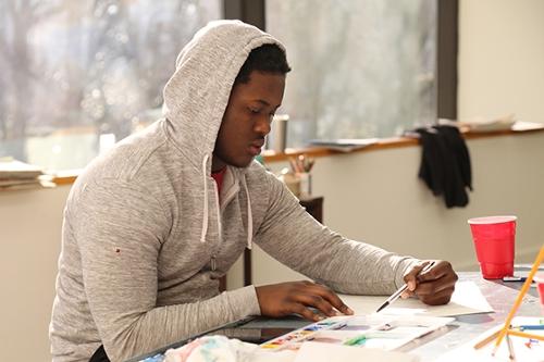Student doing a preliminary sketch in a painting and drawing class. Pursue your art and design degree at LaGrange College. 